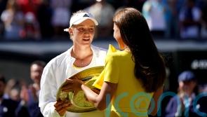 Russia-born Elena Rybakina keeps calm amid Wimbledon storm to lift title