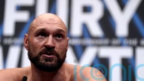 Tyson Fury makes ring return… as heavyweight champ floors WWE star in Cardiff