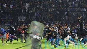 At least 125 people reportedly dead after stampede at Indonesian football match