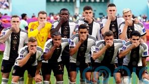 Germany praised by England fan group for covered mouths protest at World Cup