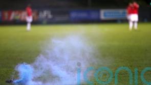 Melbourne derby abandoned as goalkeeper hit by metal bucket in ‘shocking scenes’