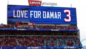 Damar Hamlin remains in hospital but ‘is in good spirits’ after cardiac arrest