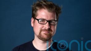 Creator of popular animated series awaits domestic violence trial