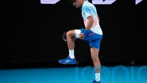 Djokovic taking hamstring injury ‘day to day’ as he progresses in Melbourne