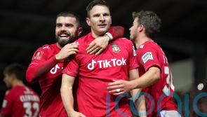 Paul Mullin brace keeps Wrexham on tail of leaders Notts County