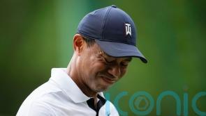 Tiger Woods makes slow start in his 25th Masters and Jon Rahm launches fightback
