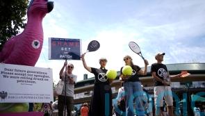 Climate activists protest against Barclays’ sponsorship outside Wimbledon gate