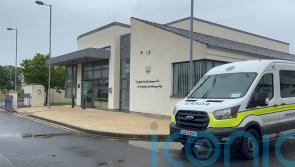 Man, 38, charged with murder after body found in water