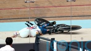 Great Britain’s team pursuit world title defence ends with crash in qualifying