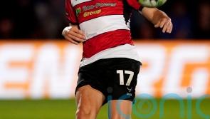 Doncaster win again to dent Wrexham’s automatic-promotion hopes