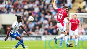 Paul Mullin scores 100th Wrexham goal in win at relegation-threatened Colchester