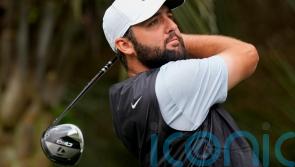 Scottie Scheffler five strokes ahead with weather forcing a Monday finish