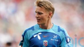 Arsenal’s Martin Odegaard limps out of Norway win with apparent ankle injury
