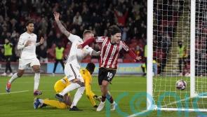 Josh Tymon’s own goal sees Sheffield United move up to third in Championship