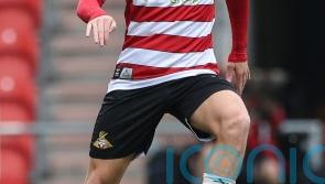 Jordan Gibson’s brace helps Doncaster to victory at 10-man Grimsby