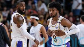 Lebron James plays alongside son Bronny in pre-season outing