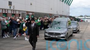 Fans applaud as Sir Tom Farmer’s hearse passes Easter Road