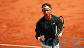 Lorenzo Musetti avoids disqualification after kicking a ball at a line judge