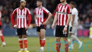 Lincoln see off Luton after late drama