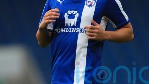 Kristian Dennis’ late strike earns Tranmere victory at Grimsby