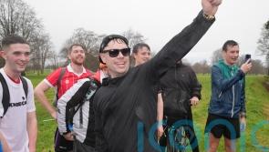 Kneecap&rsquo;s Moglai Bap greeted by Irish president during charity run