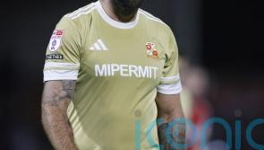 Ollie Palmer&rsquo;s penalty takes Swindon level at the top of League Two