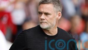 Graham Alexander hails &lsquo;intelligent&rsquo; Bradford for late win over nine-man Wigan