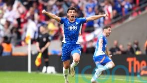 Late Kian Harratt goal for Oldham knocks Walsall off the top of the table