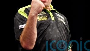 Michael van Gerwen beats debutant Gian van Veen to win Premier League opener