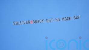 West Ham need extra time to beat Burton as fans protest against owners