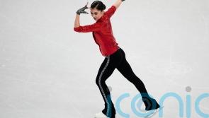 Teen Russian figure skater with controversial coach makes Winter Olympics debut