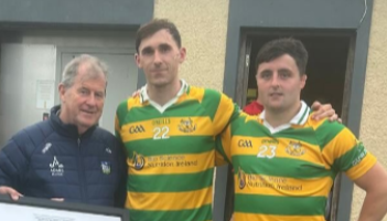 JP McManus makes a special presentation to a Limerick GAA club