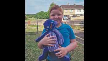 Volunteers plan a life-changing home for Alex, 11