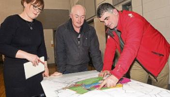 Noreen O'Connell, executive planner, LCCC; David Moloney and Cllr Richard O'Donoghue at the public information evening  Picture: Dave Gaynor