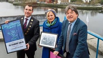 Music collector Nicky Woulfe, right, making a presentation to Mayor James Collins and Cllr Marian Hurley Picture Brendan Gleeson