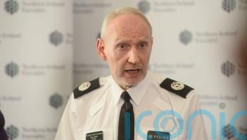 Nine police officers ‘decontaminated’ in hospital after Belfast incident