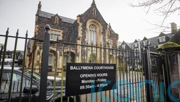 Man accused of sending threatening messages to MLA Trevor Clarke faces court