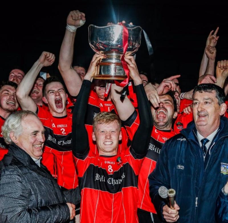 Adare Captain Shane Doherty receives the Daly Cup from Paddy Mulvihill Picture: Keith Wiseman