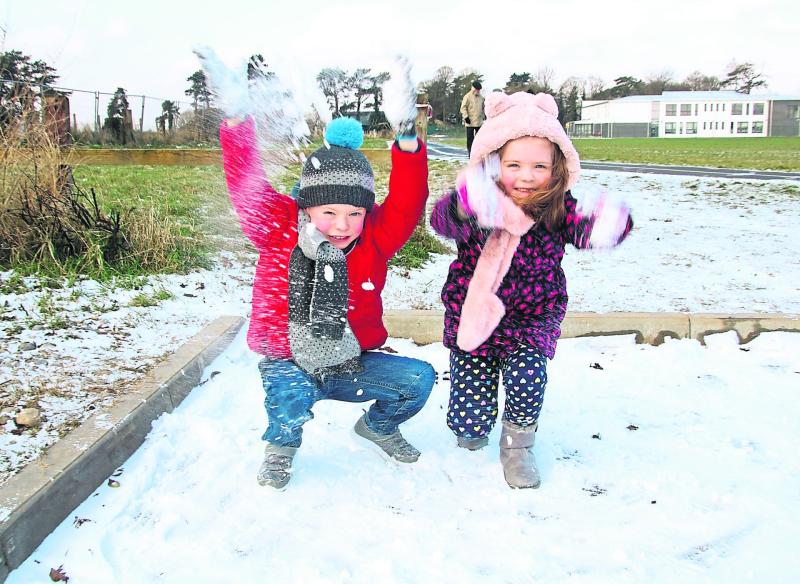 Joshua and Aliona Hannigan from Dooradoyle enjoying the snow Picture: Adrian Butler