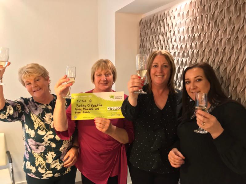 Telly Bingo Snowball winner, Betty O’Keeffe, second left, with members of her family in the National Lottery winners’ room