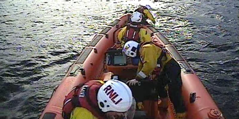 Search launched for three people and their dog 