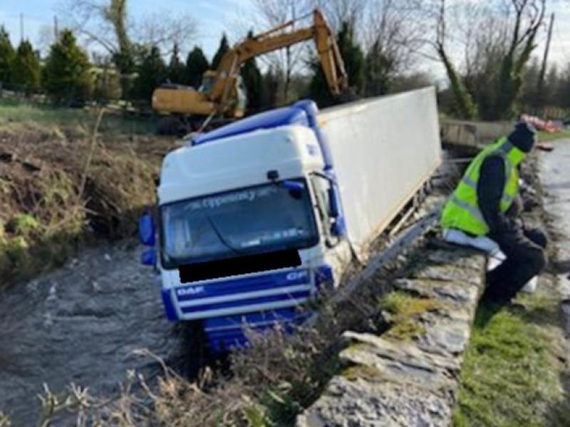 Truck crashes through wall into Limerick river