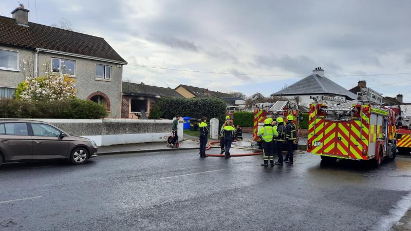 Emergency services attend the scene of a house fire in Limerick city