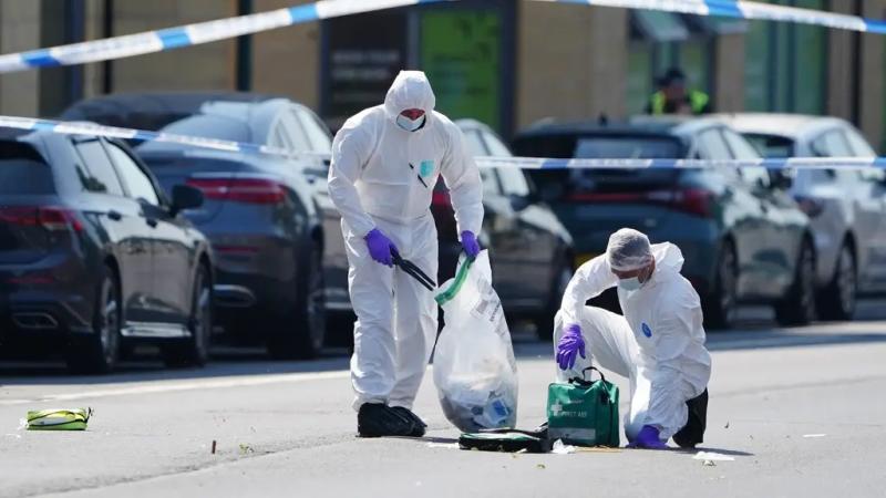 Man charged with murder of students and school caretaker in Nottingham