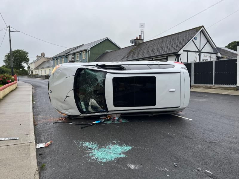 Driver has lucky escape after car turns on its side in Limerick