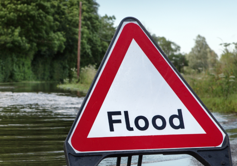 WARNING: River bursts it banks beside busy main Limerick-Cork road