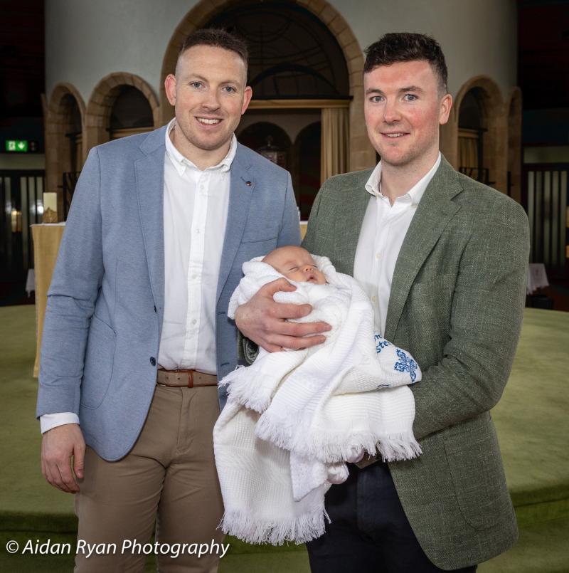 Baby Tommy in safe hands with Limerick captain Declan Hannon as godfather