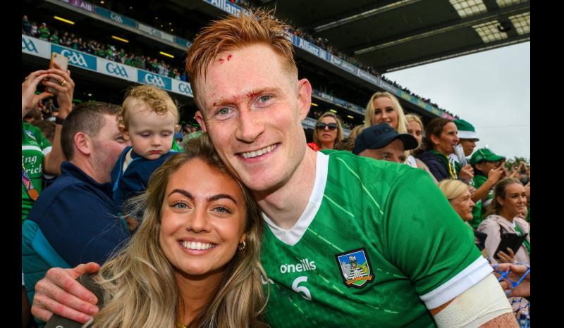 TURN AROUND! Limerick hurler William O’Donoghue pops the question to girlfriend Gemma Cowen in endearing festival proposal