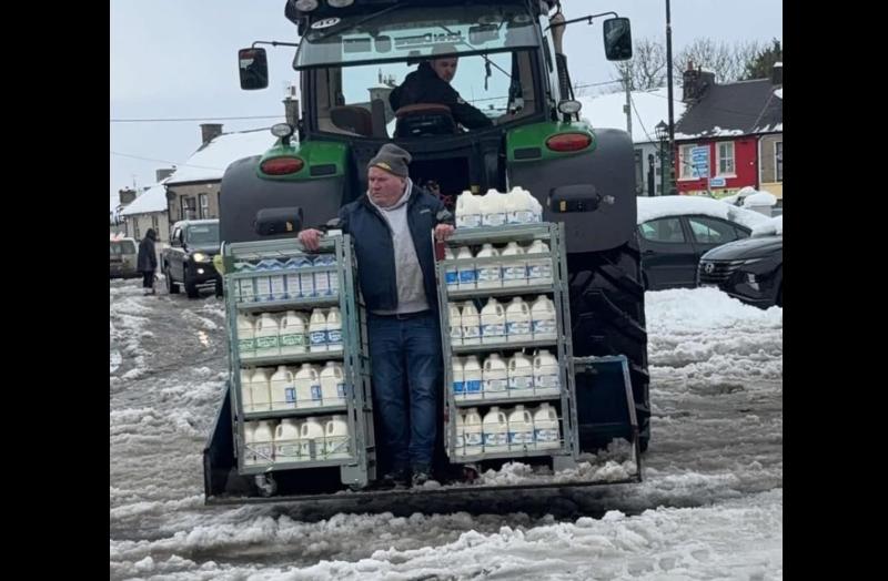 Special delivery for County Limerick shop as men deliver milk on back of tractor during cold snap