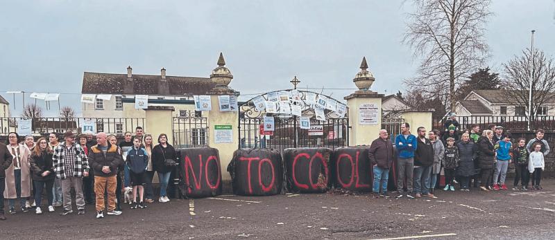 Silage bale barricade outside Limerick convent suspended